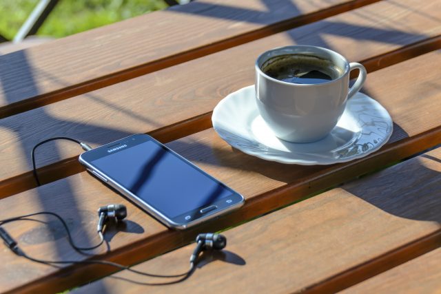 Relax with a smartphone and coffee